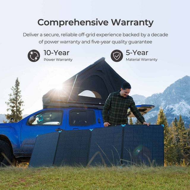 Person setting up solar panels next to a blue truck with mountains in the background, emphasizing a comprehensive warranty.