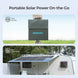 Renogy portable solar power station with a person carrying it and a solar panel on a caravan.